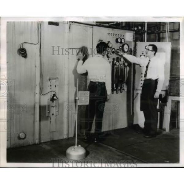 1959 Press Photo Two Linde engineers control High Current DC Arc Torch #1 image