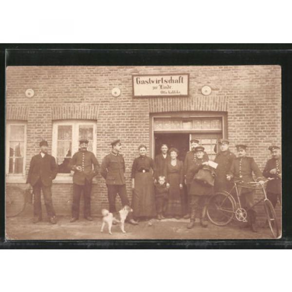 Foto-AK Westermoor, Soldaten vor dem Gasthaus zur Linde mit Fahrrad und Hund #1 image
